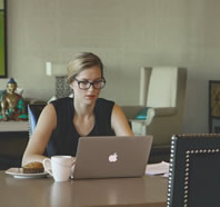 Woman learning at laptop